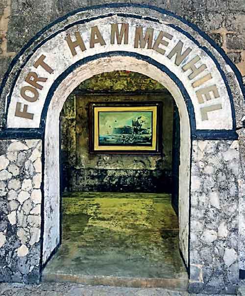 Entrance of Fort Hammenhiel, Jaffna, Sri Lanka, a historic Dutch fort with stone walls and heritage artwork