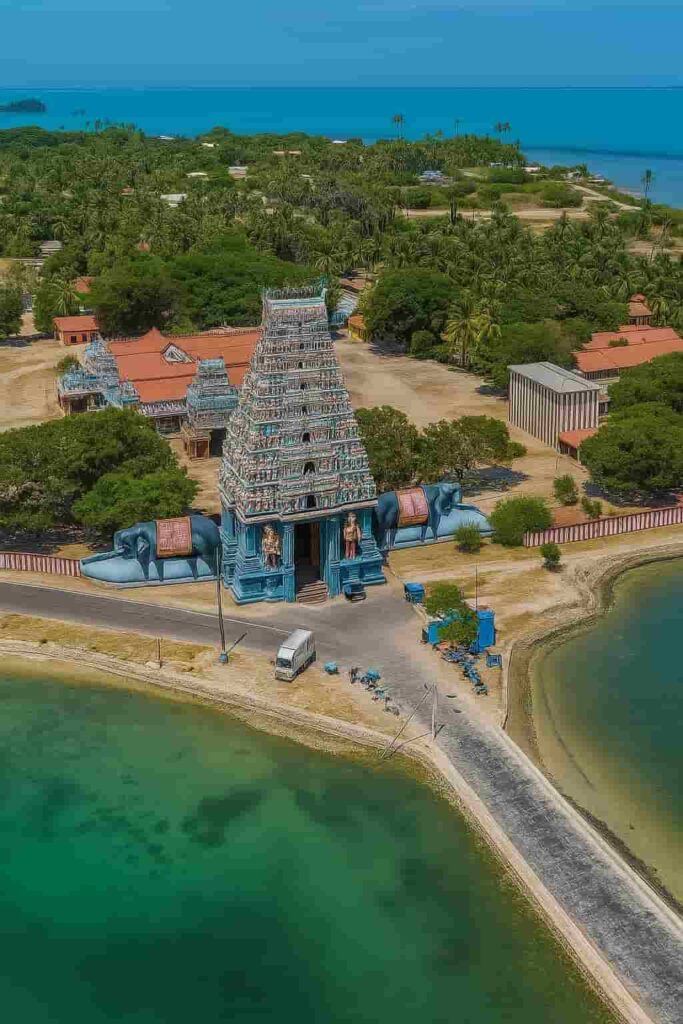 Aerial view of Nagapooshani Amman Temple in Nainativu Sri Lanka surrounded by turquoise lagoon and lush greenery