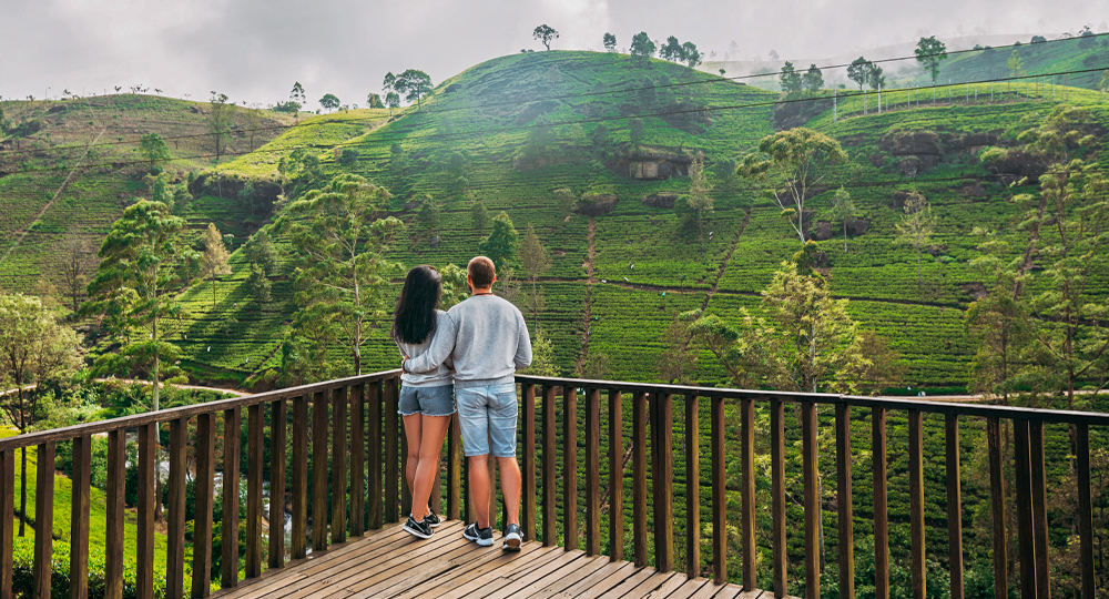 Couple enjoying scenic Nuwara Eliya hills—budget-friendly Sri Lanka tour package by EswarTours