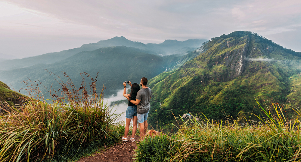 Romantic couple at Ella Rock viewpoint Sri Lanka – top honeymoon and mountain adventure destination by Eswar Tours